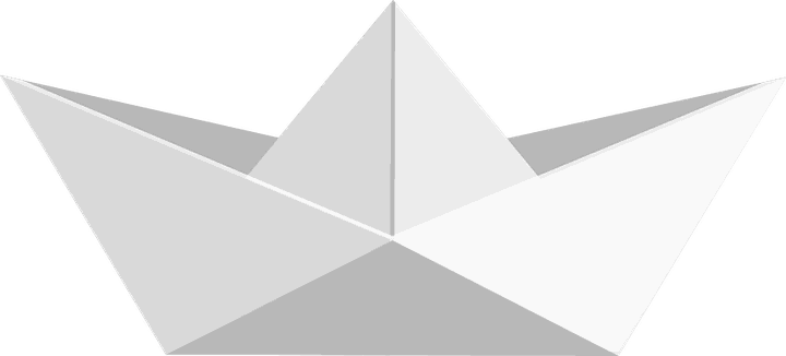 A boat folded from white paper